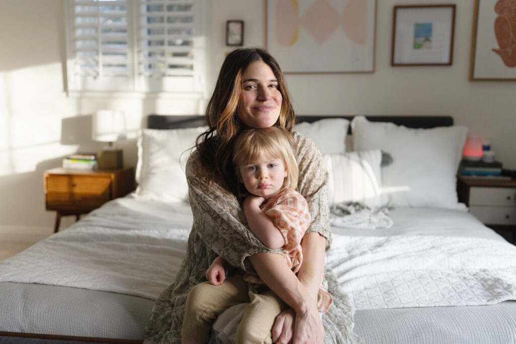 mom and daughter dressed elegantly in her home nursery in Littleton, Colorado.